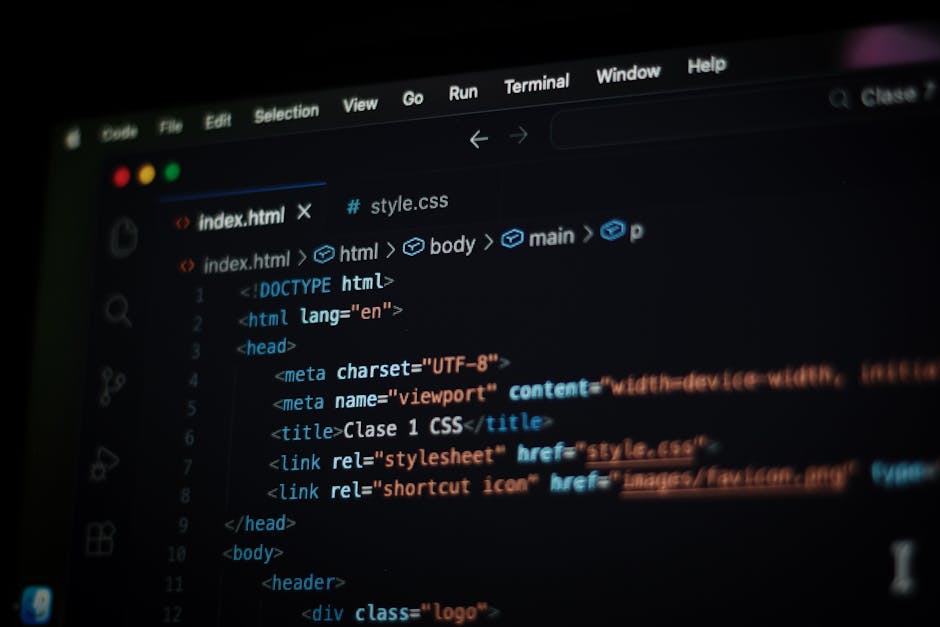 The image displays a blurry photograph of a computer screen with lines of highlighted code in various colors including blue, yellow, green, and purple on a dark background. The code snippets appear to